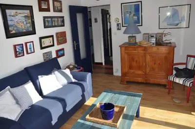 Coin salon dans l'établissement Maison de vacances au bord de la plage