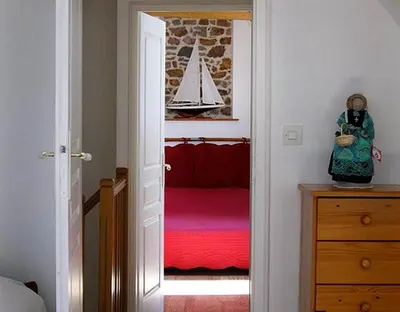 Un ou plusieurs lits dans un hébergement de l'établissement Gîte Les 3 Voiles