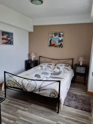 Un ou plusieurs lits dans un hébergement de l'établissement appartement proche de la mer