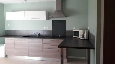 Cuisine ou kitchenette dans l'établissement appartement proche de la mer