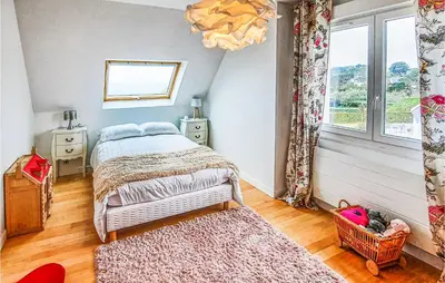 Un ou plusieurs lits dans un hébergement de l'établissement Cozy Home In Plouarzel