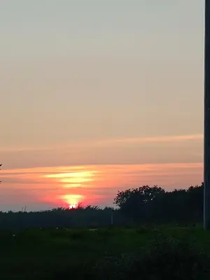 Lever ou coucher de soleil vu de la maison de vacances ou à proximité
