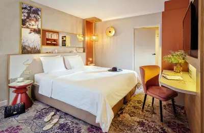Un ou plusieurs lits dans un hébergement de l'établissement Hôtel Valdys Thalasso & Spa - Beau rivage