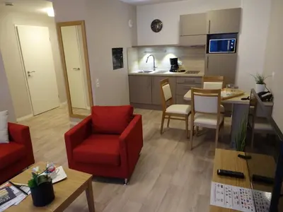 Cuisine ou kitchenette dans l'établissement Domitys La Chaloupe Bleue