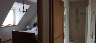 Salle de bains dans l'établissement La Roseraie