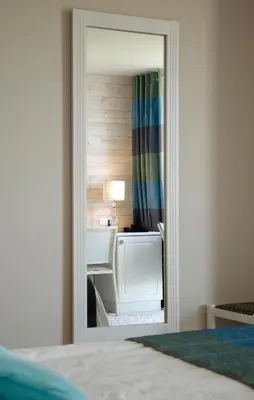 Un ou plusieurs lits dans un hébergement de l'établissement Logis Hôtel Vent d'Iroise
