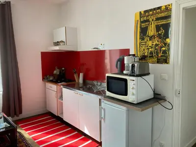 Cuisine ou kitchenette dans l'établissement T2 Quartier du Rosmeur