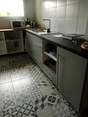 Cuisine ou kitchenette dans l'établissement Le Rocher du Samoyède