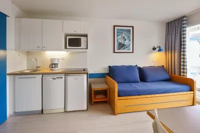 Cuisine ou kitchenette dans l'établissement Résidence Pierre & Vacances la Corniche de la Plage