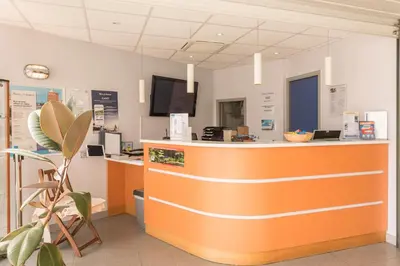Télévision ou salle de divertissement dans l'établissement Résidence Pierre & Vacances la Corniche de la Plage