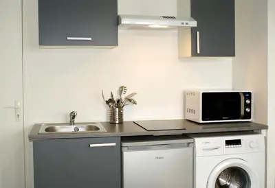 Cuisine ou kitchenette dans l'établissement Studios meublés Brest Saint Marc
