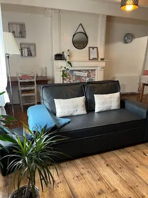 Coin salon dans l'établissement Duplex au lin