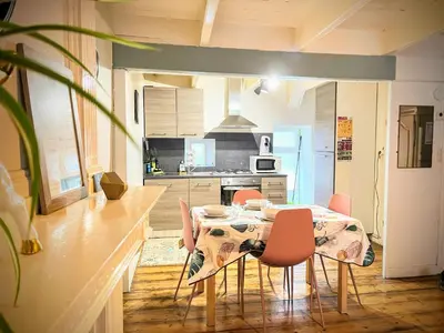 Cuisine ou kitchenette dans l'établissement Duplex au lin