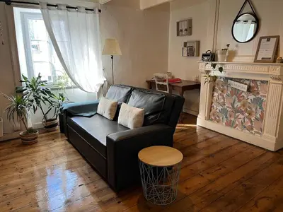 Coin salon dans l'établissement Duplex au lin