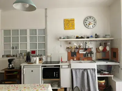 Cuisine ou kitchenette dans l'établissement Grand Studio Type Loft