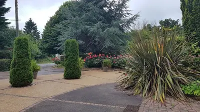 Jardin de l'établissement Chez Herveline Le Fer - Chambres et table d'hôtes