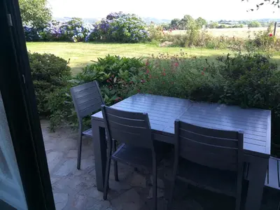 Jardin de l'établissement Chez Herveline Le Fer - Chambres et table d'hôtes