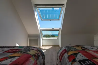 Un ou plusieurs lits dans un hébergement de l'établissement La maison des gardiens de l'Océan & spa - Les Gîte de Fabie - Plougonvelin