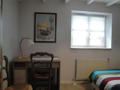 Un ou plusieurs lits dans un hébergement de l'établissement Maison de vacances
