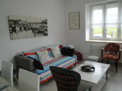 Coin salon dans l'établissement Maison de vacances