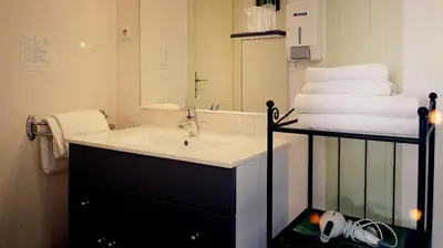 Un ou plusieurs lits dans un hébergement de l'établissement Hôtel Fontaine, Morlaix