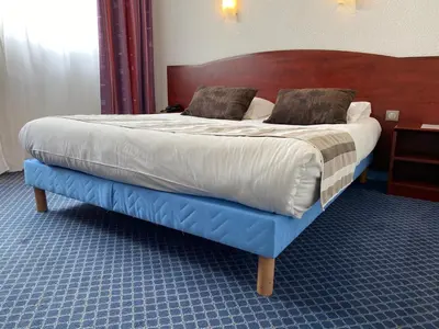 Un ou plusieurs lits dans un hébergement de l'établissement Hôtel Fontaine, Morlaix