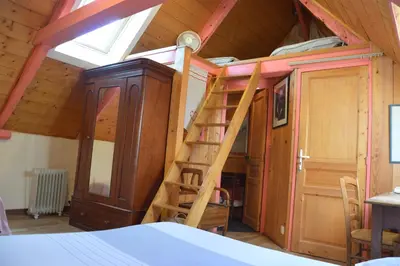 Un ou plusieurs lits dans un hébergement de l'établissement La Grange de Coatélan
