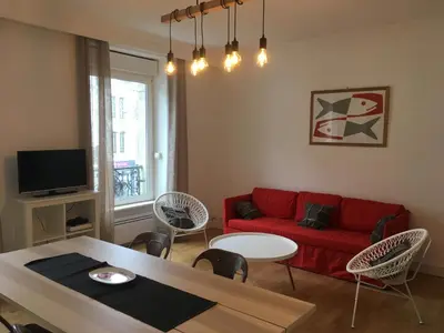 Télévision ou salle de divertissement dans l'établissement LA VILLE A LA MER N°1