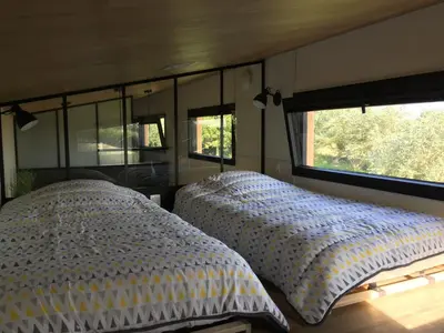 Un ou plusieurs lits dans un hébergement de l'établissement Tiny House sur la cote bretonne