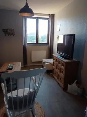 Télévision ou salle de divertissement dans l'établissement Gîte du Kreizker