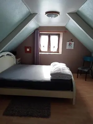 Un ou plusieurs lits dans un hébergement de l'établissement Gîte du Kreizker