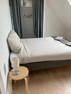 Un ou plusieurs lits dans un hébergement de l'établissement Maison Jardin De La Baie - Parking - Jardin Clos - Douarnenez