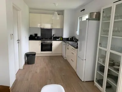 Cuisine ou kitchenette dans l'établissement Maison Jardin De La Baie - Parking - Jardin Clos - Douarnenez
