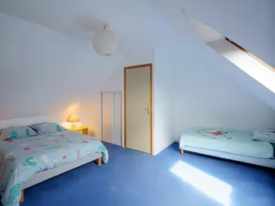 Un ou plusieurs lits dans un hébergement de l'établissement Holiday Home maison bleue by Interhome
