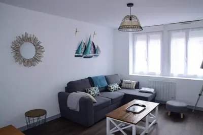 Coin salon dans l'établissement Maison Rouge