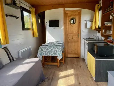 Cuisine ou kitchenette dans l'établissement Roul'hôte du bout du monde