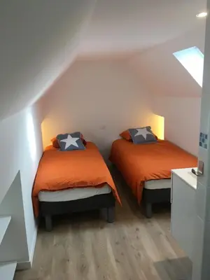 Un ou plusieurs lits dans un hébergement de l'établissement La ville à la mer numéro 2 duplex en plein coeur du centre ville au calme terrasse et parking privé
