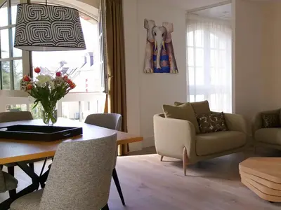 Coin salon dans l'établissement Hôtel Ginkgo - SPA Biloba