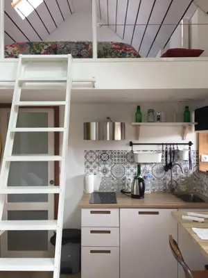 Cuisine ou kitchenette dans l'établissement Le Gîte 