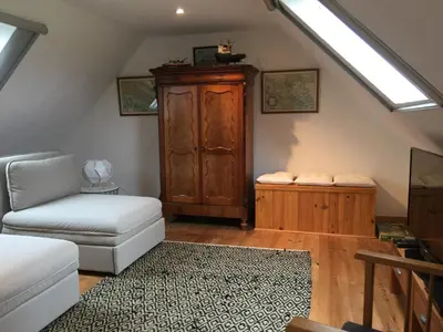 Coin salon dans l'établissement La Colline des Renards