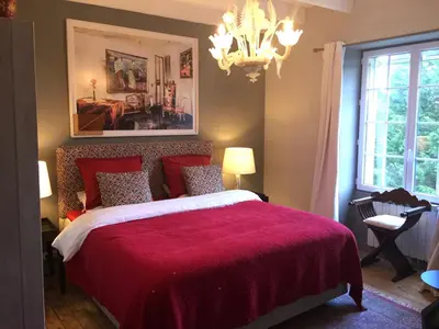 Un ou plusieurs lits dans un hébergement de l'établissement La Colline des Renards Chambres