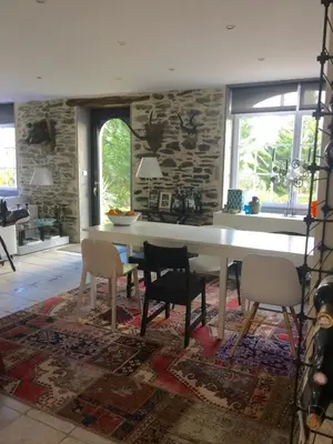 Coin salon dans l'établissement La Colline des Renards Chambres