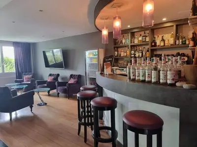 Coin salon dans l'établissement Cozy hôtel logis Morlaix