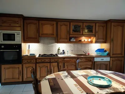 Cuisine ou kitchenette dans l'établissement La petite maison bleue