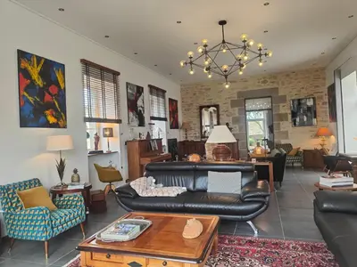Coin salon dans l'établissement Le Vieux Couvent & SPA