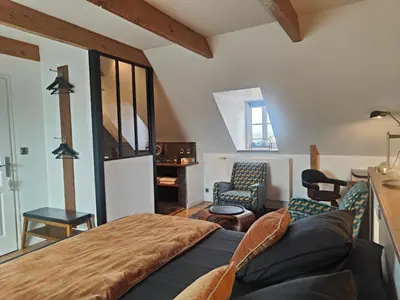 Coin salon dans l'établissement Le Vieux Couvent & SPA