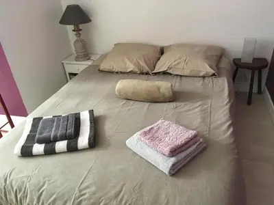 Un ou plusieurs lits dans un hébergement de l'établissement Appartement Cœur Saint-Martin