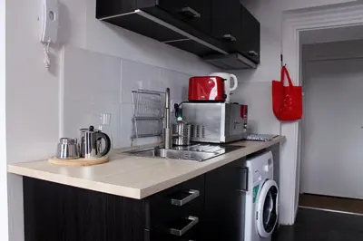 Cuisine ou kitchenette dans l'établissement Le secret d'Oscar & la fantaisie de Jean