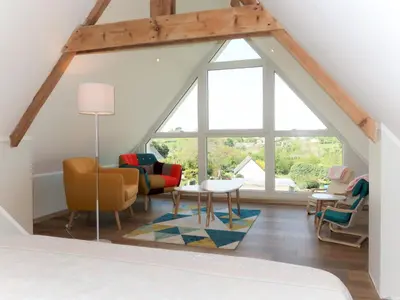 Coin salon dans l'établissement Holiday Home Reve de Mer by Interhome