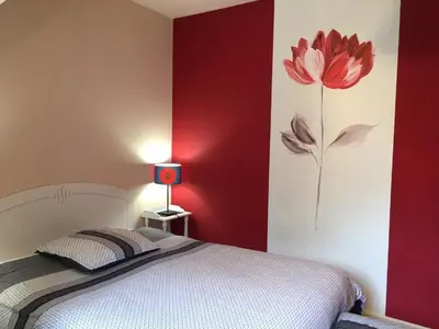 Un ou plusieurs lits dans un hébergement de l'établissement Chambres d'hotes Chez Annie